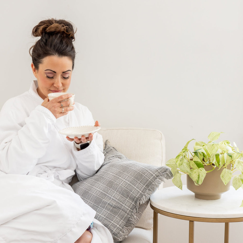 Woman drinking protein coffee