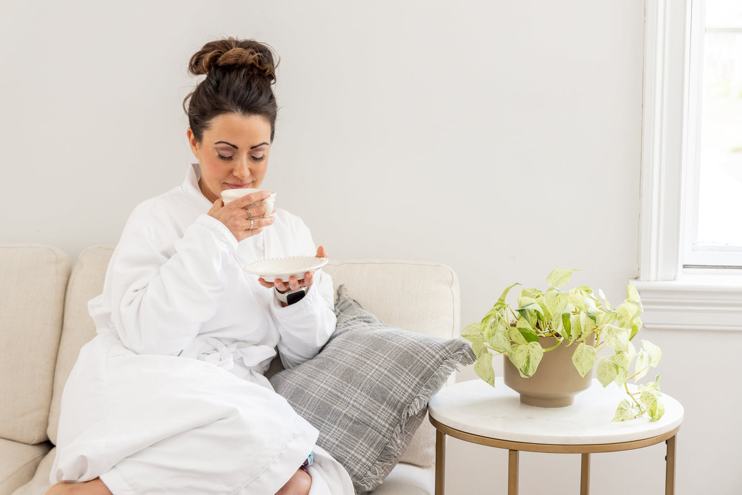 Woman drinking protein coffee